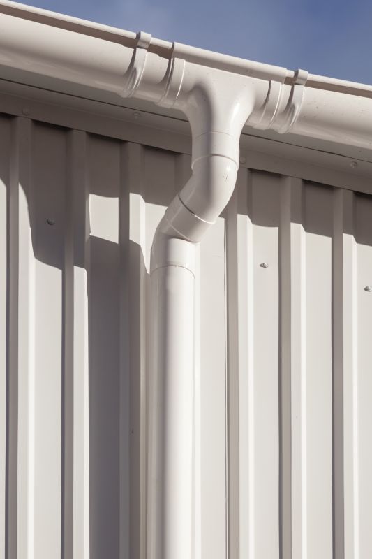 Gutter System with Downspouts